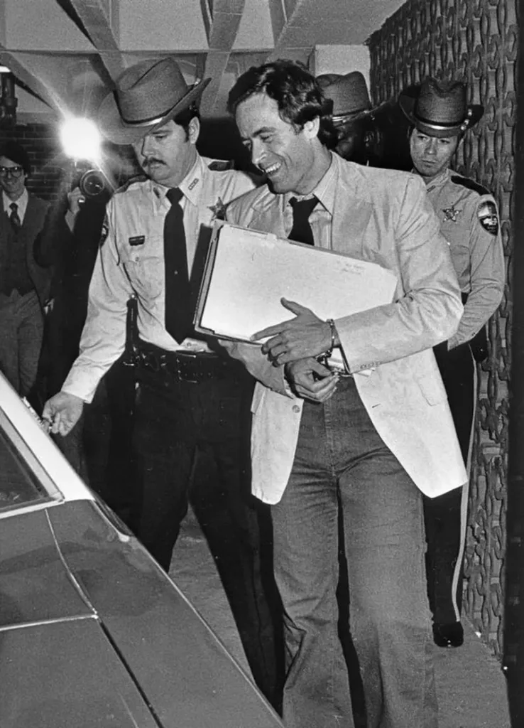 Departing a preliminary hearing, Miami, 1979