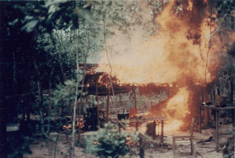 US soldiers burn a wooden structure in a village in eastern Cambodia in May 1970