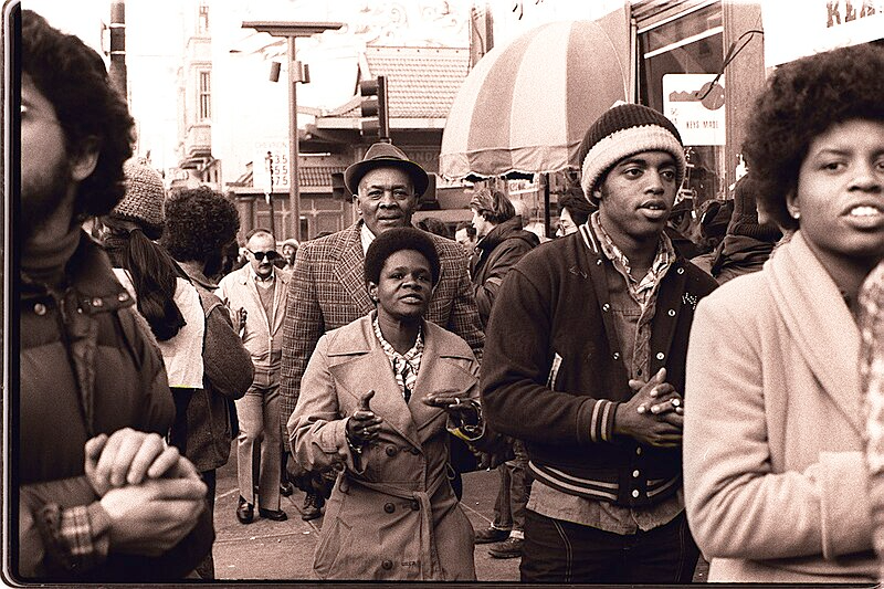 Peoples Temple members attend an anti-eviction rally at the International Hotel, San Francisco, January 1977.