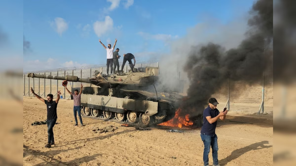 Hamas militants destroy an Israeli tank