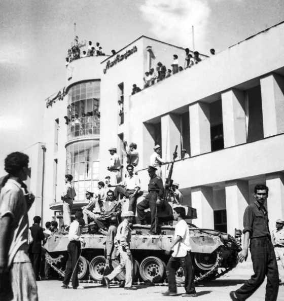 On August 19, 1953, just minutes after pro-shah troops had taken over the region during the coup that overthrew Mohammad Mossadegh and his government, a royalist tank enters Tehran Radio's courtyard.