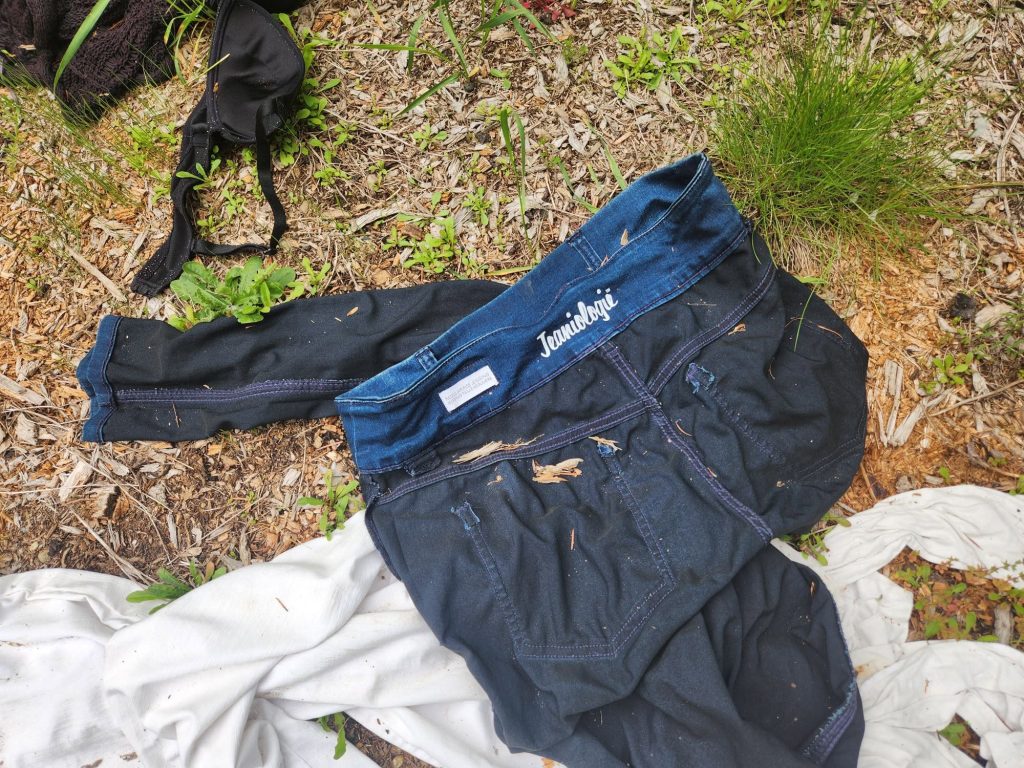 Human clothing next to the remains that were found near Hatchery, Qualicum River. Photo Credits: Sarah Brown